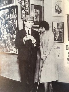 Hannah Höch and Raoul Hausmann next to their artworks