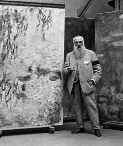 Claude Monet with large paintings