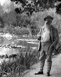 Claude Monet near his lily pond