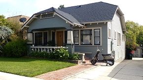 Example of typical Arts & Crafts bungalow with hipped roof, this one in Los Angeles, California