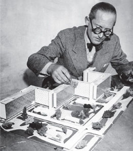 Le Corbusier presenting a model neighborhood