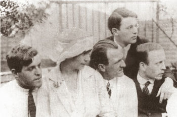 Wieland Herzfelde, Eva and George Grosz, Rudolph Schlichter (lower right corner) and John Heartfield in 1922.