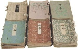 This photograph shows six early issues of Kokka: <i>An Illustrated Monthly Journal of the Fine and Applied Arts of Japan and Other Asian Countries</i>, in the Japanese language version, hand-sewn to open left to right.