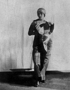 Sonia Delaunay in <i>Simultaneous dress</i>, c. 1913.