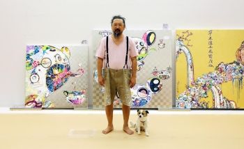 Fumino Osada's 2017 photograph shows Murakami in his Tokyo studio with his dog Pom and several artworks in the background.