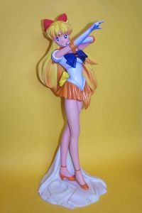 Bome's <i>Sailor Venus</i> (2000) is a collectible figurine, depicting the character from the popular <i>Sailor Moon</i> (1991-1997) manga and anime series.