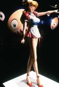 Murakami's <i>Miss Ko2</i> (1997) is an anime inspired sculpture with his recurrent character Mr. DOB in the background.