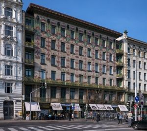 Otto Wagner, Majolikahaus (1899) in Vienna , named for the colorful floral majolica tilework that distinguishes the facade