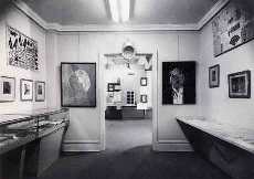 International Dada exhibition, 1953 - Duchamp's Fountain recreation (1950) is hanging over the doorway