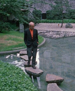Noguchi is walking through the gardens for the UNESCO headquarters in Paris, which he co-designed with Marcel Breuer in 1958