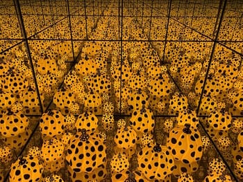Yayoi Kusama's conceptual exploration of polka dots is fused into an experiential environment in <i>The Spirits of the Pumpkins Descended into the Heavens</i>, here installed at the National Gallery of Australia (2015)