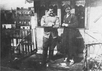 This photograph of Guillaume Apollinaire and his wife Jacqueline on the terrace of their apartment at 202 Boulevard St. Germain in Paris, France, was taken in 1918.