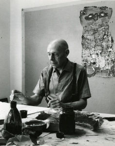 Paolo Monti's <i>Jean Dubuffet</i> (1960) shows the artist at work in his studio.