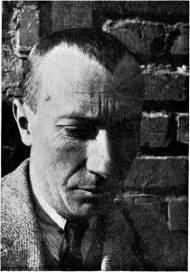<i>Hans Arp</i> (c. 1925), by an unknown photographer, shows the artist in a 1926 issue of <i>De Stijl</i> that featured his work.