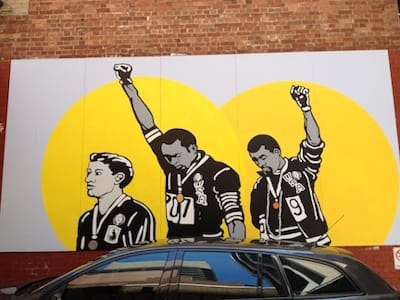 Richard Bell and Emory Douglas' mural depicting the 1968 Olympics Black Power salute, painted in Burnett Lane, Brisbane, Australia.