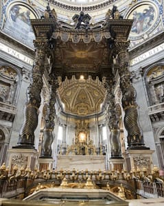 The monumental bronze canopy of the baldachin at the center of <i>St. Peter's Basilica</i> in the Vatican is the work of two geniuses destined to become enemies.