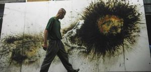 Cai working in his studio (c.2013)