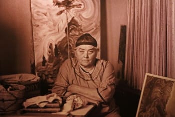 Artist Emily Carr in her studio, surrounded by her nature paintings, in 1939.