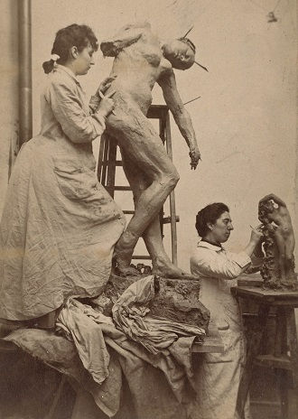 Camille Claudel and Jessie Liscomb in their studio at 117 rue Notre-Damedes-Champs in 1887. Claudel is working on a version of <i>Shakuntala</i>