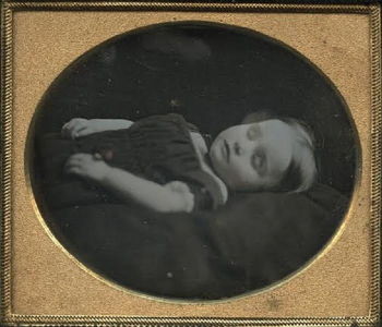 “Hidden mother photography” was a term applied to a type of “post-mortem” daguerreotypes in which Victorian mothers hid discretely behind veils and curtains while holding their dead child.