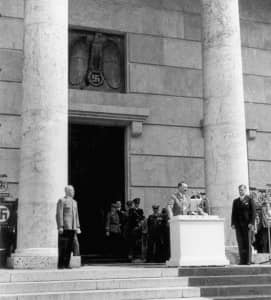 Adolf Hitler giving a speech at the opening of the <i>Deutsche Kunstausstellung</i> (<i>Great German Art Exhibition</i>) at the Haus der Deutschen Kunst in Munich on July 18, 1937.