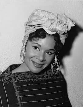 Katherine Dunham (c. 1956). Sinclair writes, “Dunham would change the future of dance forever by honoring sacred tradition in modern choreography”.