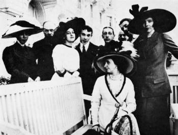Supporters and members of the Ballets Russes. c.1912. Left to right: unknown woman in hat, Pavel Koribut-Kubitovitch, Tamara Karsavina, Vaslav Nijinsky, Igor Stravinsky, Alexandre Benois, Sergei Diaghilev, K Harris. Front: Alexandra Vassilieva