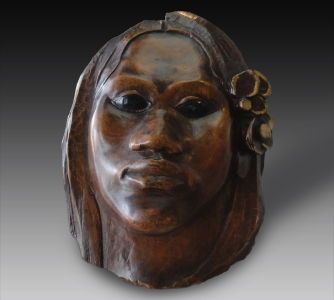 Though it resembles a traditional portrait Paul Gauguin's <i>Head of a Tahitian Woman with a Standing Female Nude on the Reverse</i> (c. 1891-94) is a hollow mask. The piece was hand-carved from Tahitian wood and then painted.