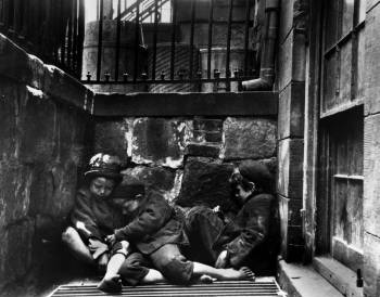 Jacob Riis's <i>Children sleeping in Mulberry Street</i> (1890) made a powerful statement about slum life, as it showed these three children sleeping on a grate.