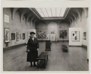 Photograph of Katherine Dreier in the exhibition <i>Modern Art</i> - <i>Société Anonyme Painting</i>