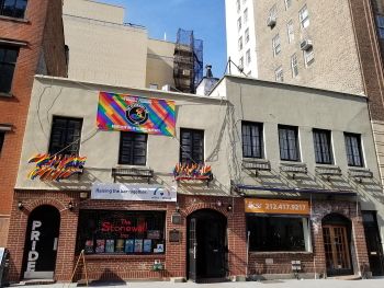 The Stonewall Inn (a gay bar in New York's Greenwich Village, pictured here in 2011), was the site of a historic multi-day riot that took place in June 1969, when bar patrons fought back against a police raid (which was a common occurrence at known gay bars and clubs). This event is now recognized as one of the most significant catalyzing forces in the LGBT rights movement, and the Stonewall Inn is now an official National Historic Landmark.