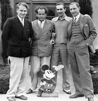 From left to right this photo shows Aleksandrov, Eisenstein, Disney, Tisse (with Mickey Mouse), June 1 1930.