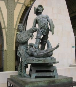This work, produced by the artist's son in law, Aimé Morot shows Gérôme on the left as he works on on of his <i>Gladiators</i> sculptures.