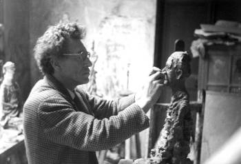 Giacometti in his Montparnasse (Paris) studio, photographed by his wife Annette.
