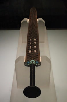 A replica of the ancient Chinese <i>Sword of King Goujian</i>, with blue glass inlay.