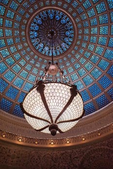 This 38-foot Tiffany Glass Dome, designed in 1897 by chief mosaicist Jacob Adolphus Holzer, is found in the Preston Bradley Hall at the Chicago Cultural Center, and is comprised of 30,000 individual pieces of Favrile glass, assembled in 243 sections held together in a cast iron frame.