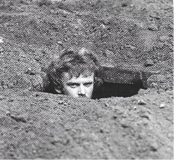 Andy Goldsworthy digging one of his first large scale holes in Haarlem (1984)