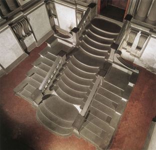 Michelangelo's innovative design for the entrance room of the Laurentian Library (1523-1571) in its fluid expressiveness influenced Mannerist architecture.