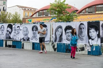 Portraits installed in Madrid, Spain, in 2012, as part of JR's <i>Inside Out</i> project.