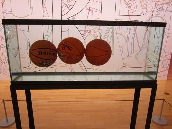<i>Three Ball Total Equilibrium Tank</i> (1985), forms part of <i>The Equilibrium</i> series and combines the aesthetics of Minimalism with an instantly recognisable symbol of American sport and popular culture.