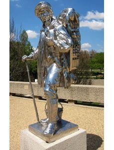 <i>Kiepenkerl</i> (1987) is a stainless steel version of a well-known German statue from Munster, depicting a travelling merchant. Originally created in 1896, the statue was destroyed during the Second World War and was replaced in 1953 by a similar copy. Koons' replica consciously presents the historic symbol of the city as a futuristic icon.