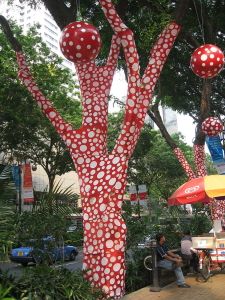 Kusama’s Ascension of Polkadots on the Trees at the Singapore Biennale 2006.