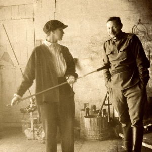 Mikhail Larionov and Natalia Goncharova working on the stage setting for the ballet <i>The Golden Cockerel</i> in 1913.