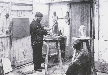 Laurens working, possibly with wife Marthe in the foreground (1912)