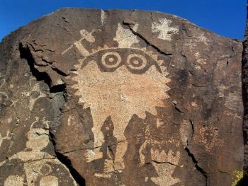 Petroglyph at Comanche Gap in the Galisteo Basin, New Mexico. In publications including <i>Undermining</i> (2014) Lippard explores the history of cultural expression in the landscape, from ancient petroglyphs to contemporary land art, and her own experience, while living in the Galisteo Basin, of the ways in which that history is threatened by capitalist exploitation and neglect of the land.