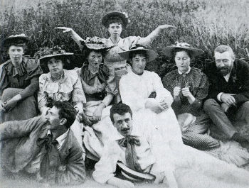 Back Row: Frances Macdonald - Middle Row L-R: Margaret Macdonald, Katherine Cameron, Janet Aitken, Agnes Raeburn, Jessie Keppie, John Keppie Front Row L-R: Herbert McNair, Charles Rennie Mackintosh (c. 1894)