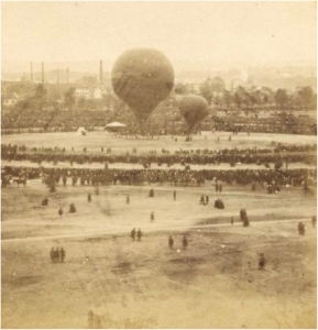 Le Géant preparing to take off, Champ-de-Mars, 1863. In this photograph, Nadar's Le Géant, the world's largest hot air balloon and traveling studio, can be seen looming over gathered crowds just prior to its maiden voyage in 1863.