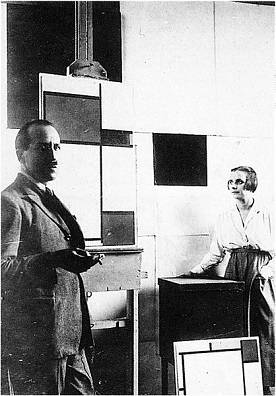 Piet Mondrian and Pétro (Nelly) van Doesburg in Mondrian's studio in Paris (1923)