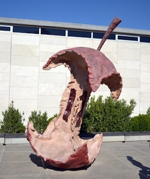 Bridging Pop Art and Neo-Pop, Swedish-American artist Claes Oldenburg created <i>Apple Core</i> (1992), a sculpture that underscores modern society's obsession with consumption and its neglect of the natural environment that sustains it.