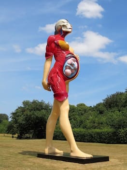 British Neo-Pop artist Damien Hirst has never shied away from shocking or disturbing imagery, as in his enormous 2005 sculpture <i>The Virgin Mother (Flesh off)</i>.